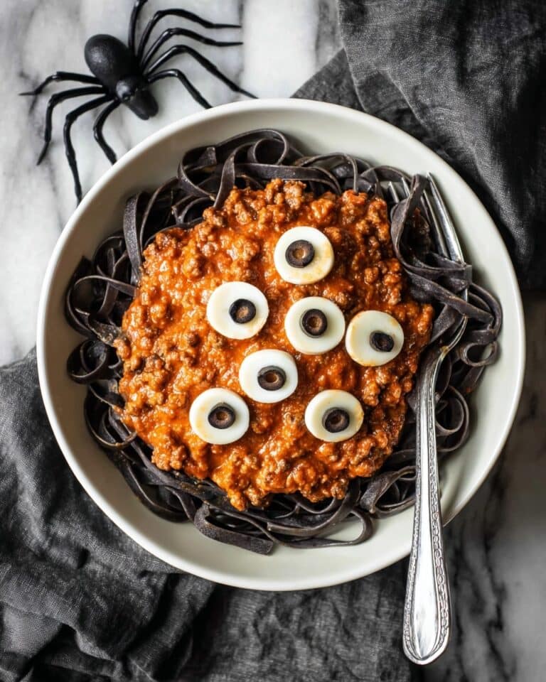 Halloween Pasta with Black Ink Noodles and Eyeball Toppings Recipe