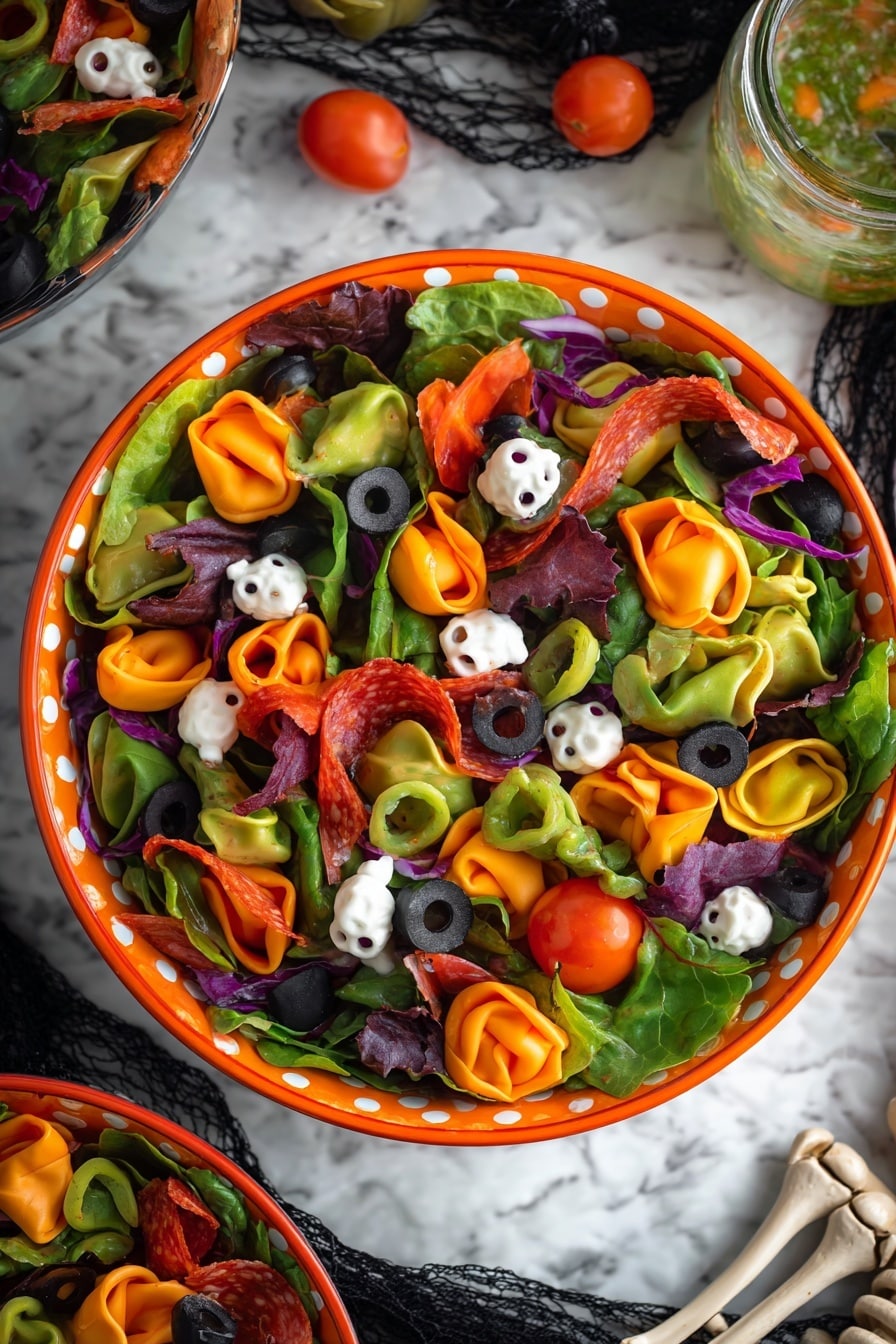 Spooky Halloween Salad with Colorful Tortellini, cheese skulls, red wine vinaigrette, Halloween party appetizer, festive fall salads - A colorful salad in a white bowl with an orange rim and white dots around it, placed on a white marbled surface covered with a black spider web pattern. The salad has three layers: the bottom layer is a mix of green and purple lettuce leaves, the middle layer contains green, orange, and purple small stuffed pasta, and the top layer includes small yellow and red cherry tomatoes, sliced black olives, red pepper rings, sun-dried tomato pieces, and small white skull-shaped toppings. Two white skeleton arms rest on the salad, crossing each other diagonally over the bowl. Nearby, there are glass bottles with green and amber liquids, adding a spooky atmosphere. Photo taken with an iphone --ar 2:3 --v 7