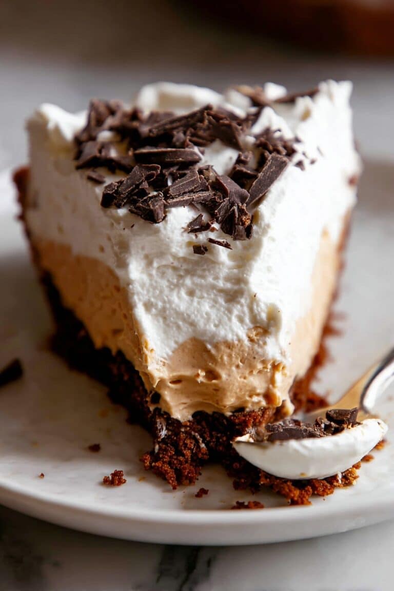 Chocolate Pumpkin Cheesecake with Bourbon Whipped Cream Topping Recipe