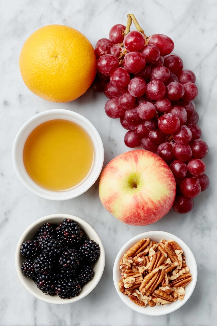 Fall Fruit Salad with Maple Cinnamon Dressing, fall fruit salad recipes, cozy fall fruit salad, healthy fall fruit salad, maple cinnamon dressing recipe - Flat lay of a whole bright orange, a small white ceramic bowl filled with amber maple syrup, a small white ceramic bowl containing fine ground cinnamon powder, a bunch of fresh red seedless grapes, a cluster of plump blackberries, a small white ceramic bowl with chopped pecans, two whole crisp sweet apples (one red and one with a blush yellow tone) placed beside each other, all arranged in perfect symmetry on a clean white marble surface, soft natural light, photo taken with an iPhone, professional food photography style, fresh ingredients, white ceramic bowls, no bottles, no duplicates, no utensils, no packaging --ar 2:3 --v 7 --p awthu7i m7354615311229779997
