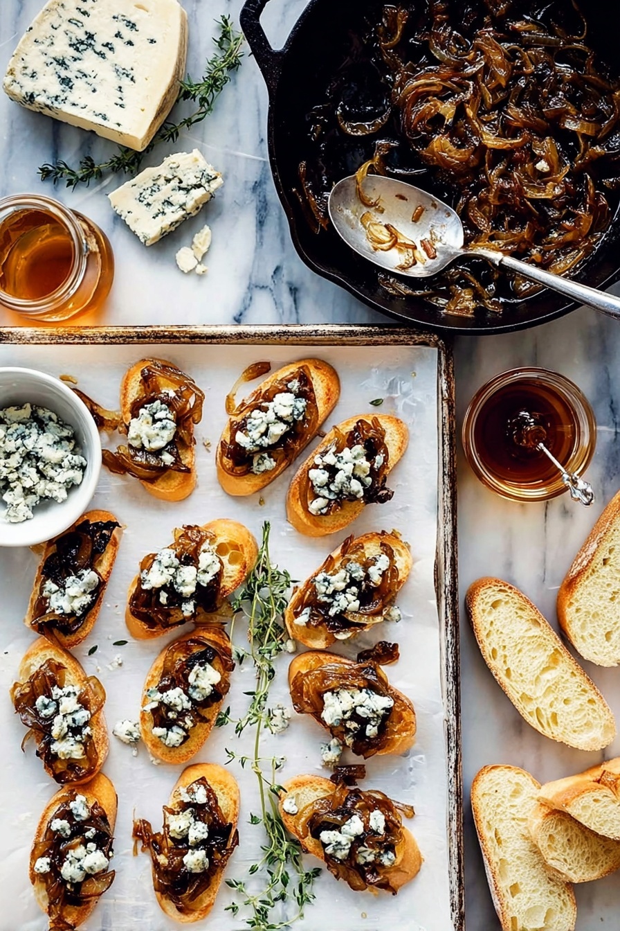 Caramelized Onion Fig Jam Crostini, savory fig crostini, easy appetizer recipes, gourmet crostini ideas, elegant party snacks - There is a white baking tray with twelve toasted slices of bread arranged in three rows of four. Each slice has a layer of dark caramelized onions topped with crumbled creamy blue cheese that is white with blue veins. To the right of the tray, there are some plain slices of bread showing a soft, light inside. Above the tray, a black cast iron pan holds more caramelized onions with a silver fork resting inside. On the left side, a wedge of blue cheese and sprigs of fresh herbs sit on the white marbled surface. Below this, a small white bowl contains more blue cheese crumbles, next to a glass jar of dark honey with a spoon inside. Photo taken with an iphone --ar 2:3 --v 7
