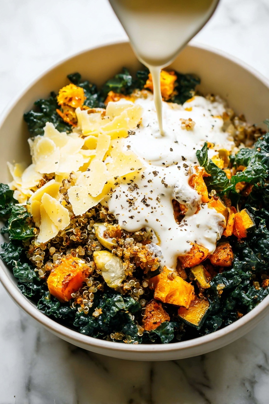 Autumn Caesar Salad with Roasted Delicata Squash, fall salad recipes, roasted delicata squash salad, healthy autumn salads, kale and squash salad - A bowl filled with a salad that has three main layers visible: the bottom layer is dark green curly kale leaves, the middle layer consists of golden-orange roasted squash cubes with a slightly rough texture, and the top layer includes off-white thin slices of cheese scattered around. There are also light beige pine nuts sprinkled on top along with some small bits of toasted breadcrumbs, and thin slices of red onion mixed in. Two gold forks are placed in the bowl, partially submerged in the salad. The bowl is white and sits on a white marbled surface. Photo taken with an iphone --ar 2:3 --v 7