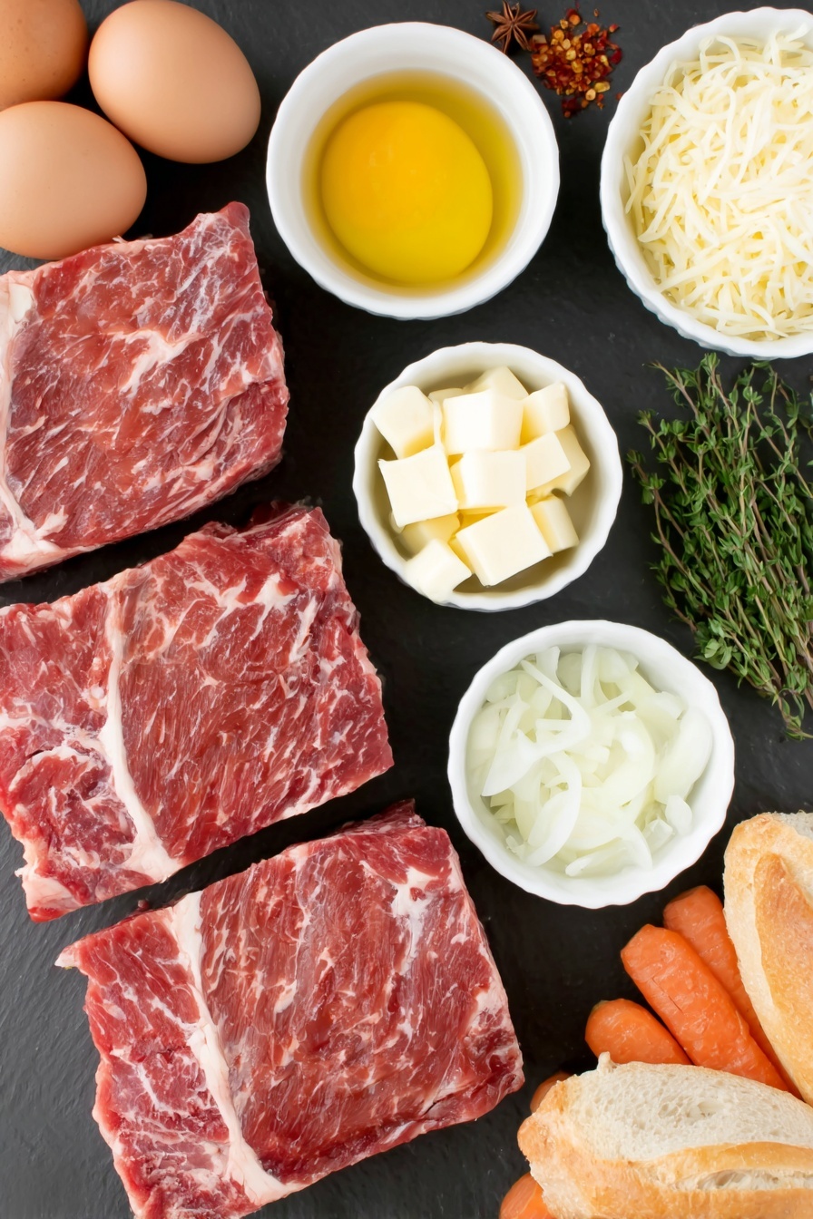 French Onion Short Ribs Bake, French Onion Short Ribs, braised short ribs with onion, cheesy short ribs casserole, comforting beef recipes - Flat lay of six whole uncracked brown eggs, a small pile of thinly sliced yellow onions, two whole fresh shallots sliced, four cloves of fresh garlic chopped, a small white bowl of golden salted butter, a small white bowl of dry white wine, a small white bowl of low sodium chicken broth, a few fresh sprigs of thyme with leaves, a sprig of fresh sage with chopped leaves, a few dried red chili flakes scattered, two fresh bay leaves, one whole star anise pod, four large bone-in beef short ribs with natural marbling, a small bunch of baby carrots, six slices of rustic French bread, and a small white bowl filled with shredded Gruyère cheese, all placed in a perfectly balanced symmetrical arrangement on a clean white marble surface, soft natural light, photo taken with an iPhone, professional food photography style, fresh ingredients, white ceramic bowls, no bottles, no duplicates, no utensils, no packaging --ar 2:3 --v 7 --p m7354615311229779997