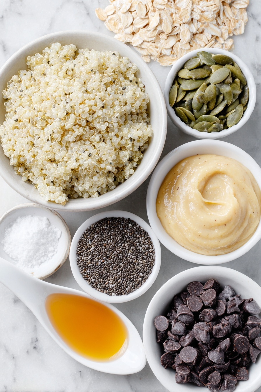 Seedy Quinoa Breakfast Cookies, healthy breakfast cookies, quinoa snack recipe, nutritious morning treats, seed-filled breakfast cookies - Flat lay of cooked fluffy quinoa grains in a simple white ceramic bowl, a small pile of rolled oats on a white ceramic plate, raw pumpkin seeds scattered neatly on a white ceramic dish, a small white bowl filled with hulled hemp seeds, a small white bowl holding shiny black chia seeds, creamy thick tahini in a small white bowl showing a drippy texture, a small white bowl of golden maple syrup, a pinch of sea salt grains arranged delicately on a white ceramic spoon-shaped dish, a small heap of semisweet chocolate chips on a white ceramic plate, all placed on a clean white marble surface, soft natural light, photo taken with an iPhone, professional food photography style, fresh ingredients, white ceramic bowls, no bottles, no duplicates, no utensils, no packaging --ar 2:3 --v 7 --p m7354615311229779997